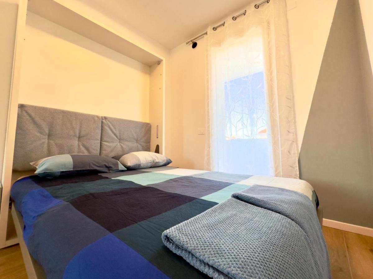 Letto matrimoniale a scomparsa aperto